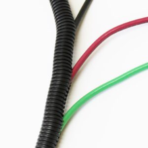 Black corrugated tubing with red and green electrical wires against a white background.