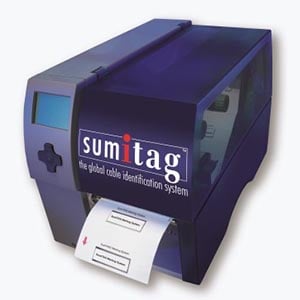 A purple and blue thermal label printer with white label output.