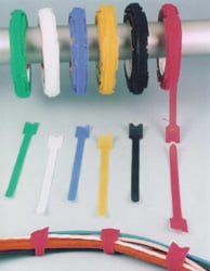 Colorful cable ties and velcro straps arranged in rows.
