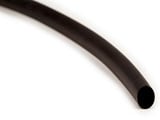Black flexible tubing or hose coiled against a white background.