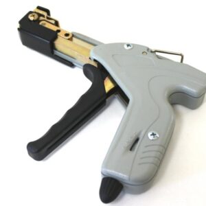 Gray and black hot glue gun with trigger mechanism and brass nozzle.