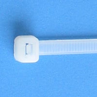 White cable tie on a blue background.