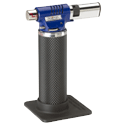 A blue and gray handheld butane torch with a stand base.