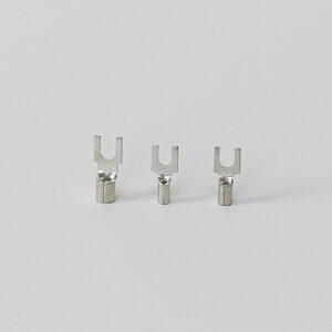 Three silver spade terminal connectors arranged in a row on a white background.