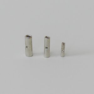 Three metal cylindrical connectors in decreasing sizes arranged on a white surface.