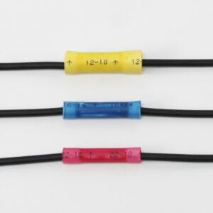 Three insulated wire connectors in yellow, blue, and red with gauge markings on black electrical.