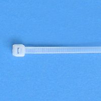 White cable tie on a blue background.