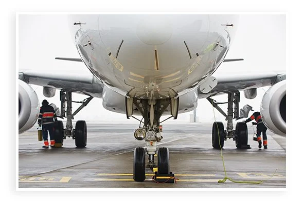 Close up of airplane nose on runway