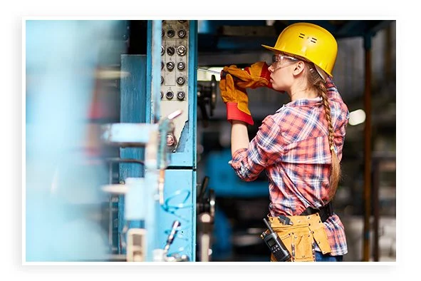 Technician working on electrical panel