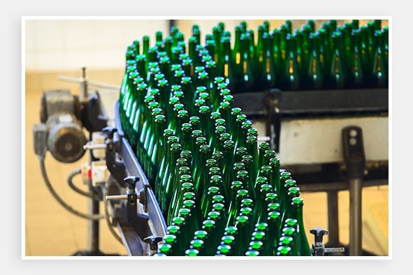 Glass bottles on a factory line