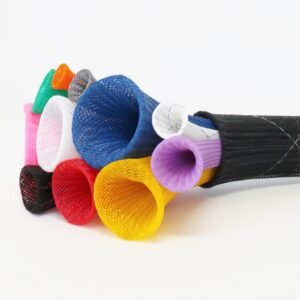 Colorful mesh cable sleeves in various colors arranged on a black braided cable.