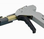 A caulking gun with a gray handle and black trigger mechanism.