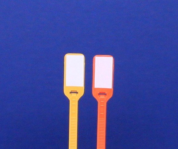 Two USB charging cables with yellow and red connectors on a blue background.