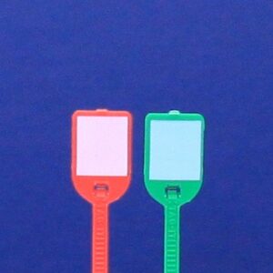 Two smartphone charging cables with red and green connectors against a blue background.