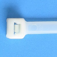 White cable tie on a blue background.