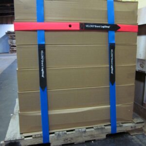 Cardboard boxes secured with blue and red VELCRO Brand LogiStraps on a wooden pallet.