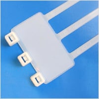 White multi-port USB charging cable with three connectors on a blue background.