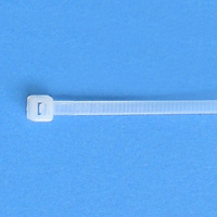 White cable tie on a blue background.