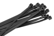 Bundle of black cable ties arranged in a fan pattern.