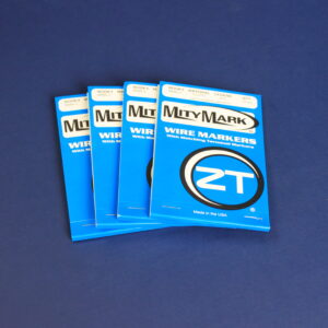 Four blue Mity-Mark wire marker packages arranged on a dark blue surface.